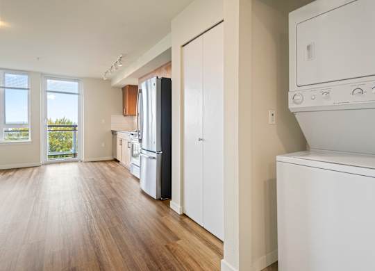 In unit stacked washer and dryer combo at Axis Seattle Apartments, Seattle, 98109