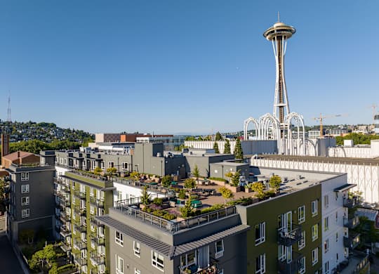 Rooftop terrace with space needle skyline view at Axis Seattle Apartments, Seattle, WA 98109