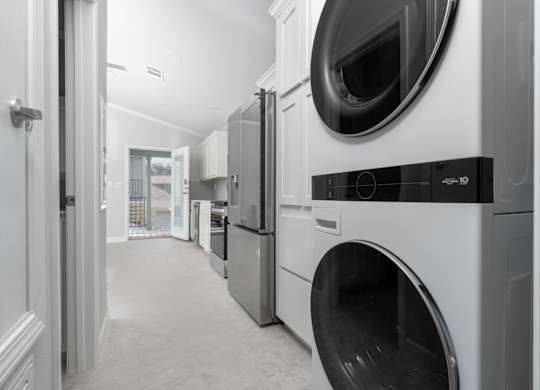 A laundry room with a washer and dryer.