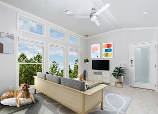 A dog is lying on a dog bed in a living room.