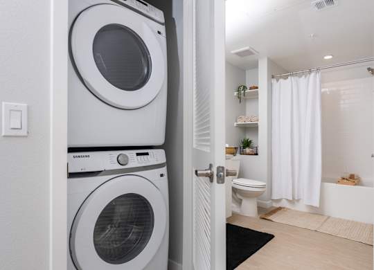 A white washing machine and dryer