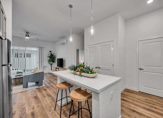 Kitchen with a Bar Stools at Estia Roseville Apartments, Roseville, 95747