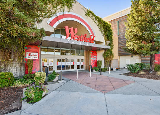 The Westfield Gallery is a modern building with a red and white sign.
