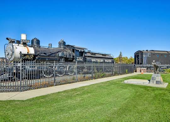A black steam locomotive with the number 2253 and the words