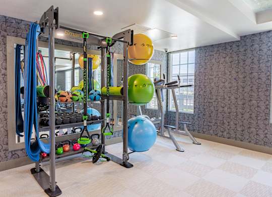 fitness center with exercise balls and yoga mats at Bayswater Apartments, Burlingame, CA