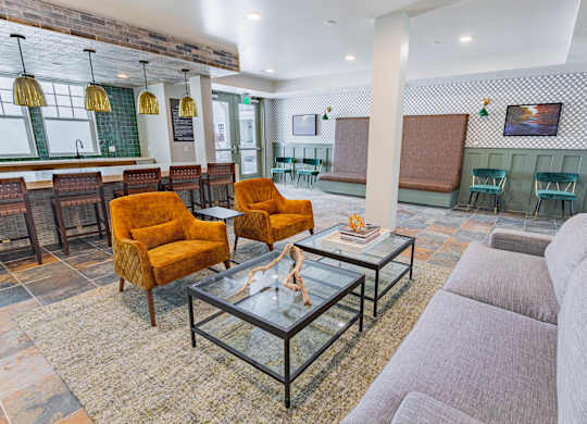 resident  lounge with stylish seating at Bayswater Apartments, Burlingame, 94010
