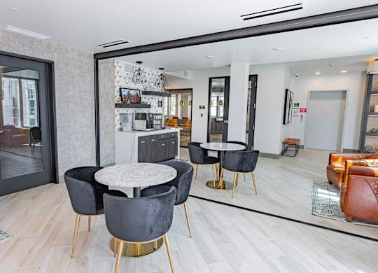 resident lounge with casual seating and drink station at Bayswater Apartments, Burlingame, CA