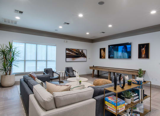Community Clubhouse With TV, Seating area with couch at Silverado, Frisco, 75034