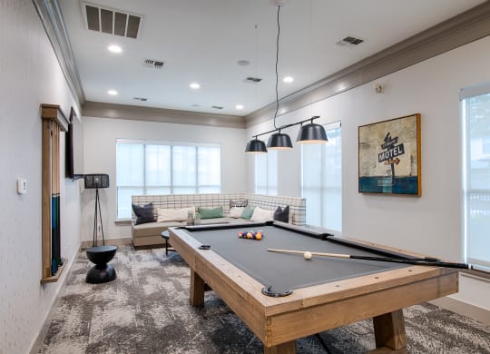 Billiards Table In Clubhouse with wide windows at Silverado, Frisco, TX, Texas