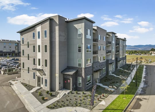an aerial view of an apartment building on a city street at Parkside at Littleton Village, Littleton, 80122