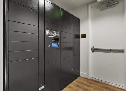 a black elevator with a door and a white door at Parkside at Littleton Village, Colorado