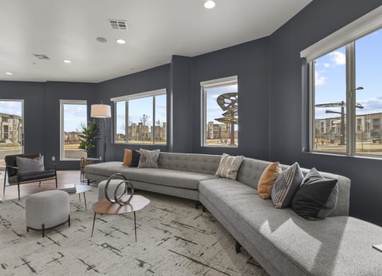 a living room with gray walls and a gray couch at Parkside at Littleton Village, Colorado