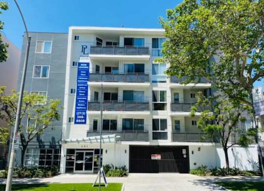Apartment Building Exterior at Plaza Lafayette, Los Angeles, CA 90057  