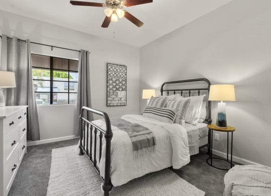 a bedroom with a bed and a ceiling fan at Vaseo Apartments, Arizona, 85022