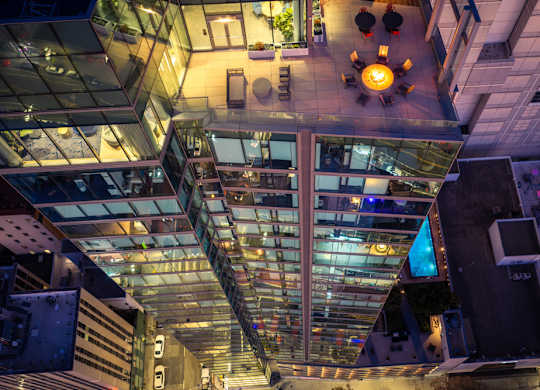 A modern building with a glass staircase.