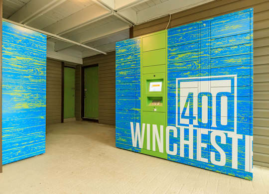 A blue and green sign that says 400 Winchester.