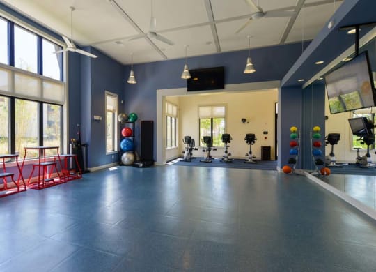 a room with a bunch of exercise equipment in it  at Cabana Club - Galleria Club, Jacksonville, FL, 32256