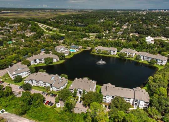 an aerial view of a lakeside community with a sailboat in the lake  at Ocean Park, Jacksonville Beach, 32250