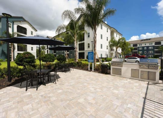 Patio with Grill and Tables at Fountainhead, Jacksonville, FL, 32258