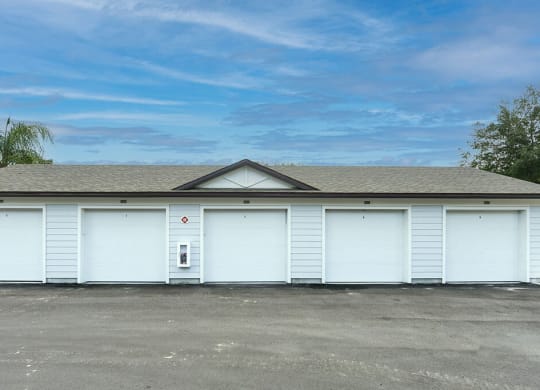 Row of White Garage Doors at Fountainhead, Jacksonville, FL, 32258