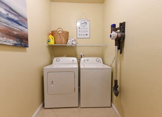 Two washing machines in a small room at Cabana Club - Galleria Club Apartments, Jacksonville, FL