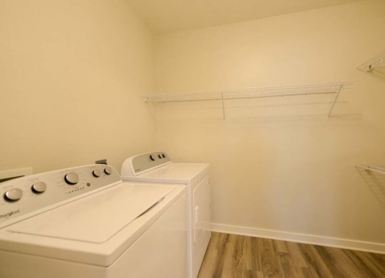 a white washer and dryer in a room  at Luxor Club, Jacksonville