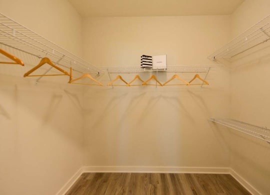a walk in closet in a bedroom  at Luxor Club, Jacksonville, FL, 32258