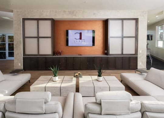 a living room filled with furniture and a flat screen tv  at Luxor Club, Florida, 32258