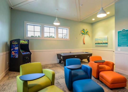 a game room with a foosball table and a pool table  at Palm Bay Club, Jacksonville, FL