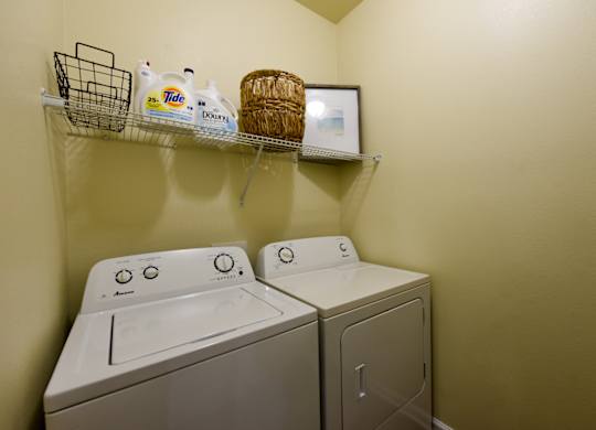 A laundry room with a washer and dryer at Cabana Club - Galleria Club Apartments, Jacksonville, FL