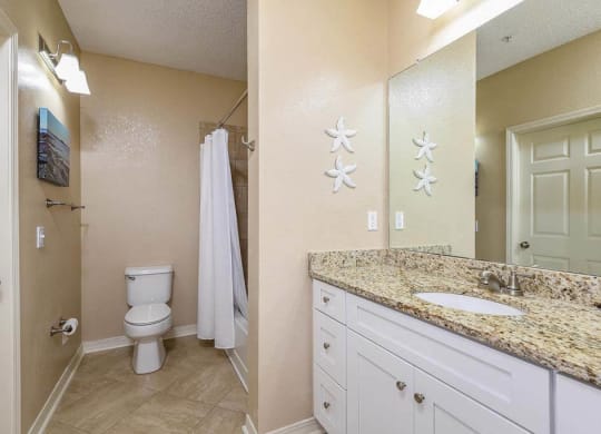 a bathroom with a sink and a toilet  at Ocean Park, Florida