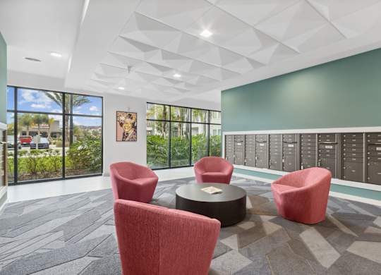 A room with a table and chairs and a window with a view of the outsideat Pinnacle Apartments, Jacksonville, FL