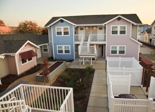 Mutual Housing at the Highlands units, fences, sidewalks, planter beds