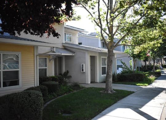 Moore Village Mutual Housing Community exterior building photo - units