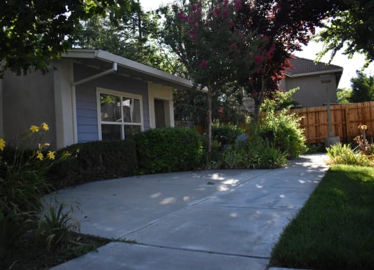 Moore Village Mutual Housing Community exterior building photo - unit