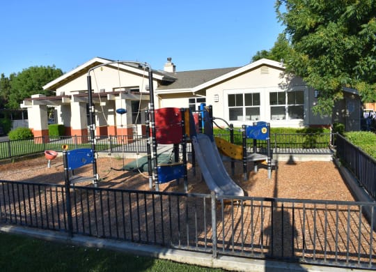 Tremont Green Mutual Housing Community playground, office/community room