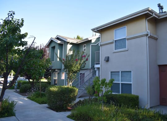 Tremont Green Mutual Housing Community unit exterior, sidewalks