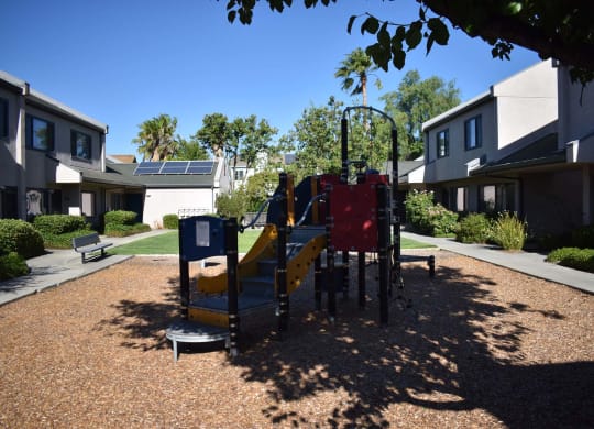 Twin Pines Mutual Housing Community courtyard and units, playground