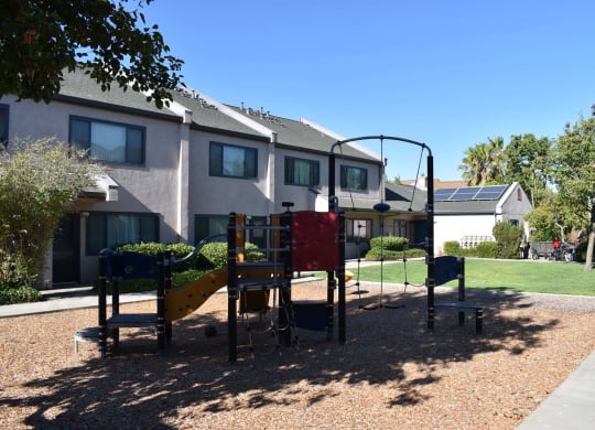 Twin Pines Mutual Housing Community courtyard and units, playground