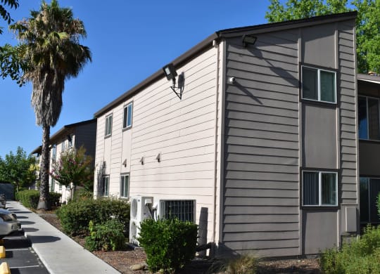 Mutual Housing at Foothill Farms unit exterior facing parking spaces