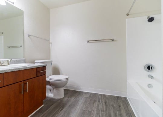 a bathroom with a toilet and a sink