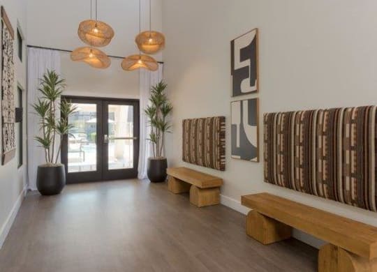 a large room with benches and drums in it