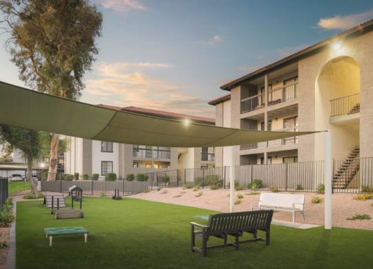 a rendering of a building with a courtyard and benches