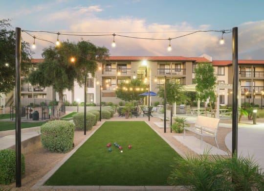 an artist s impression of the courtyard of an apartment complex