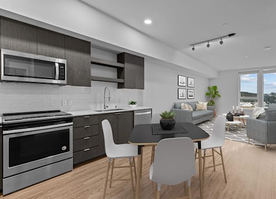 A modern kitchen with a dining table and chairs.