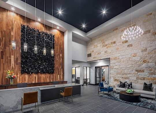 Aura Thirty2 Apartments Clubhouse with Seating