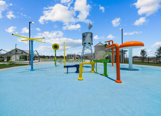 a large blue playground with slides and other playground equipment