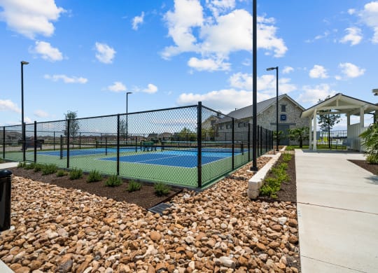 the preserve at ballantyne commons tennis courts with a tennis court and a fence