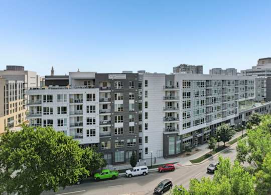 A street view of a residential area with cars and buildings. at TriVista on Speer, Denver, 80204