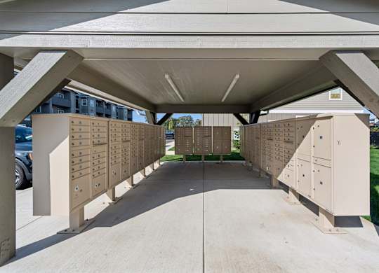 A concrete structure with a series of drawers on the sides.